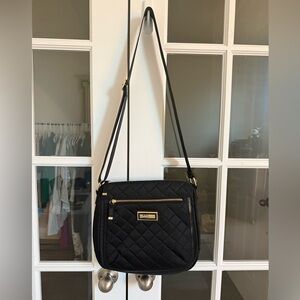 Calvin Klein  Black Quilted Crossbody Bag with Gold Accents